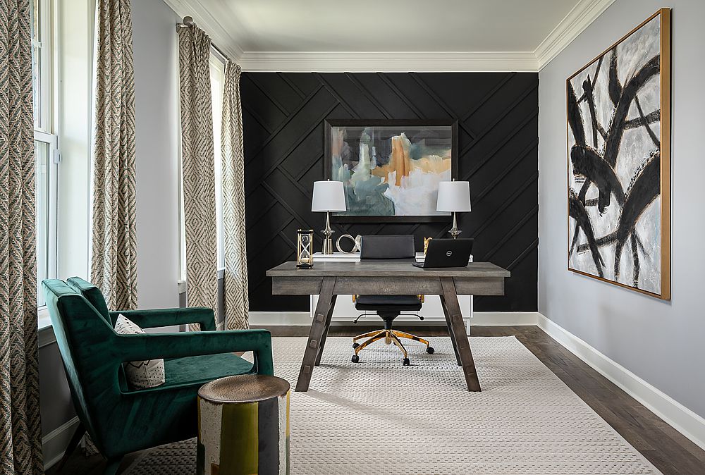Stylish green home office with personalized art and ergonomic design elements.